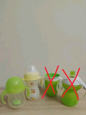 Munchkin and Mam baby training cups set