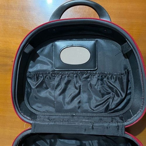 Travel toiletry bag used, red