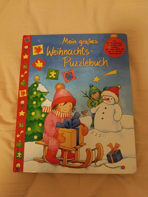 Christmas book with 15-piece puzzle and figures used