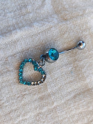 Navel piercing used with blue heart and rhinestones stainless steel