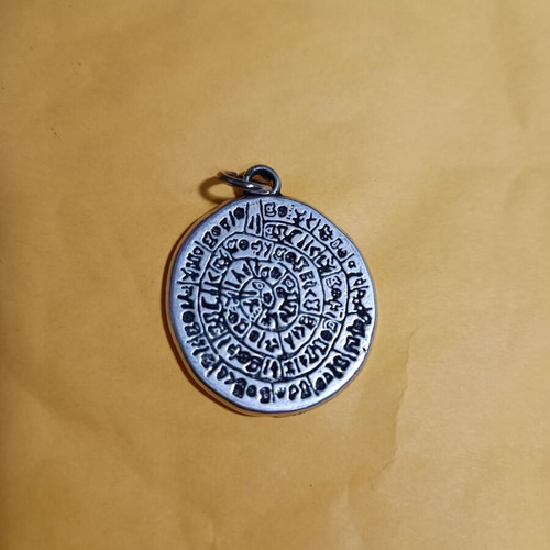 Phaistos Disc pendant silver like new, ancient emblem