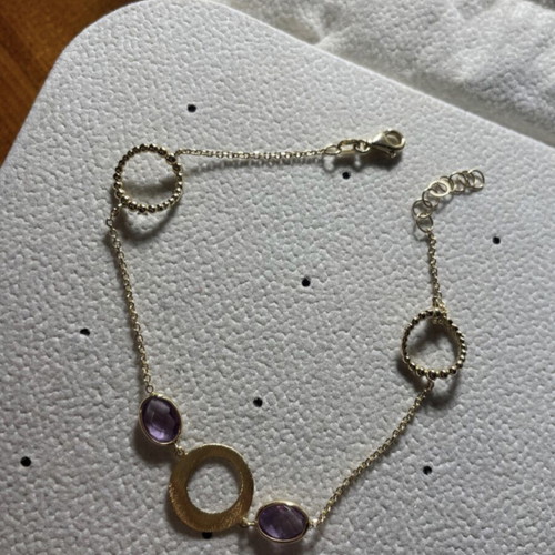 Gold bracelet new with amethyst and lilac stones