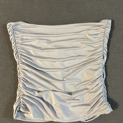 Strapless top used, ice color with decorative gathers