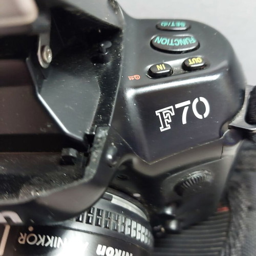 Nikon F70 used with 28-80 lens and case