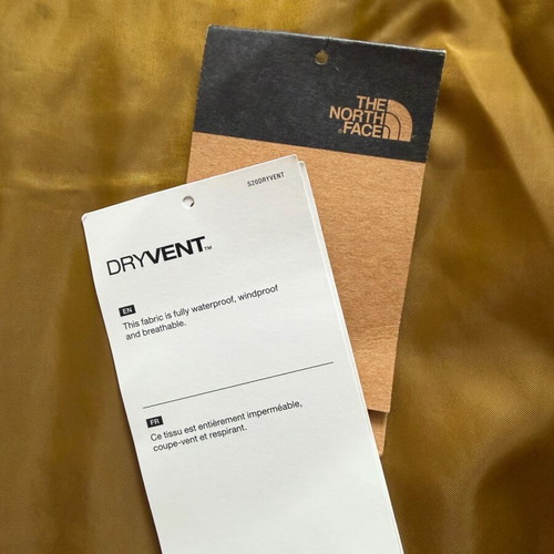 The North Face Millerton jacket like new, windproof, waterproof, black and gold