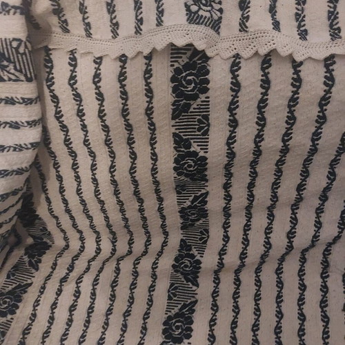 Handmade throw new, embroidered on loom