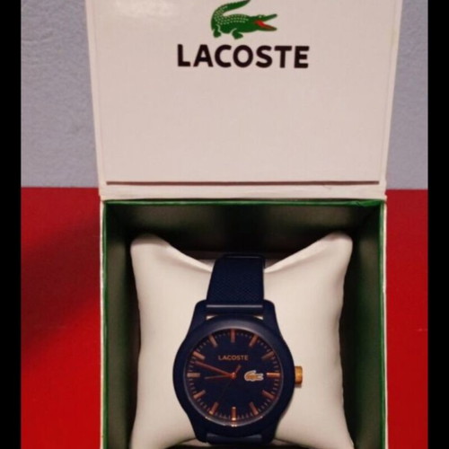 Lacoste watch used, blue rubber strap with box
