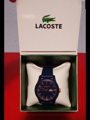 Lacoste watch used, blue rubber strap with box