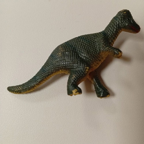 Miniature dinosaur figure like new