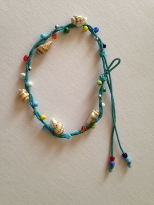 Turquoise bracelet used with shells and beads