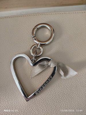 Burberry silver heart bag charm like new