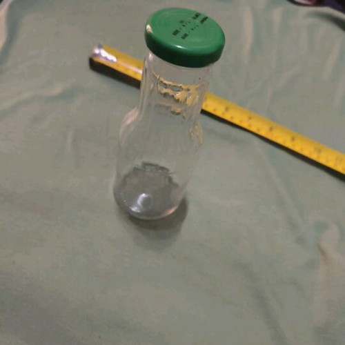 Glass decorative bottle like new for painting or storing drink and holy water