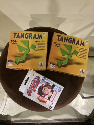 Tangram puzzle games and Guess Who card game