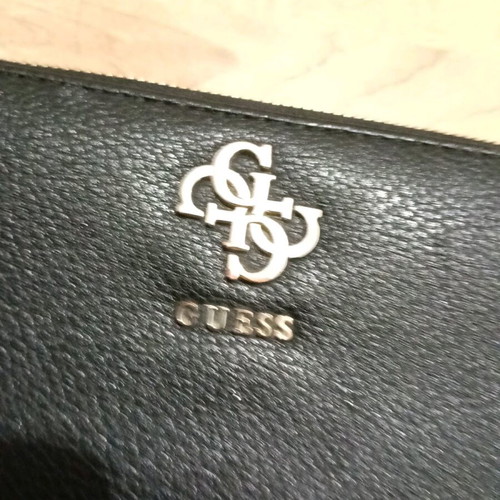 Guess wallet used, black
