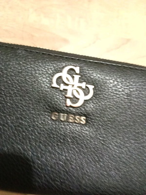 Guess wallet used, black