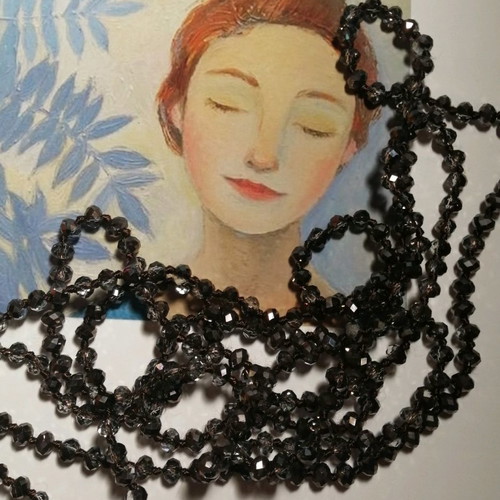 Necklace with glass gray-silver beads used