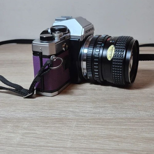 Olympus OM-10 αναλογική φωτογραφική μηχανή SLR 35mm μεταχειρισμένη με φακό Tokina RMC 28-50mm