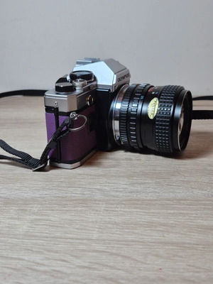 Olympus OM-10 αναλογική φωτογραφική μηχανή SLR 35mm μεταχειρισμένη με φακό Tokina RMC 28-50mm