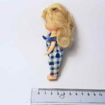 Plastic doll used with torn clothes
