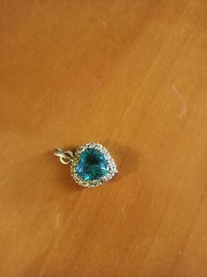 Heart-shaped pendant like new, silver with aquamarine and white zircon