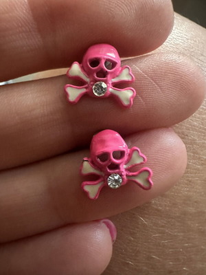 Vintage skull and crossbones stud earrings, bright pink with rhinestone