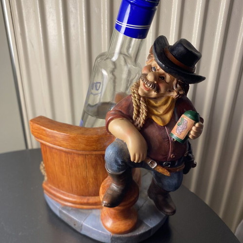 Resin figurine like new, bottle holder