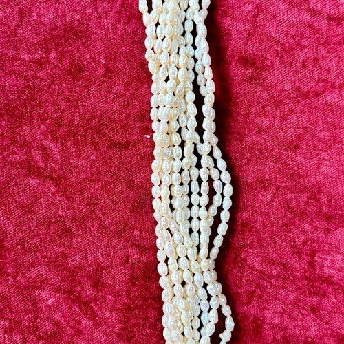 10-row bracelet with cultured pearls, 14K gold & coral
