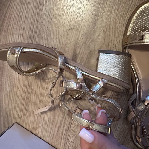 Gold sandals new with studs, size 39