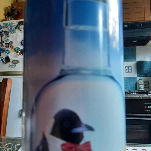 Smirnoff collectible tin and Ursus Rotter red bottle used