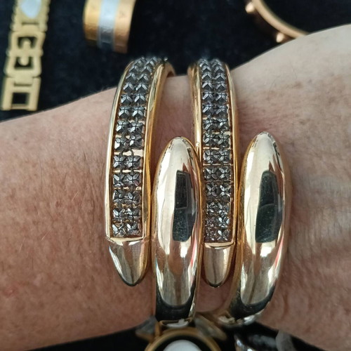 Jewelry set of 10 pieces: 4 rings, 4 bracelets, pendant, earrings