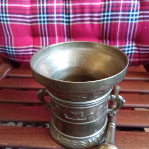 Copper mortar used with embossed decorations