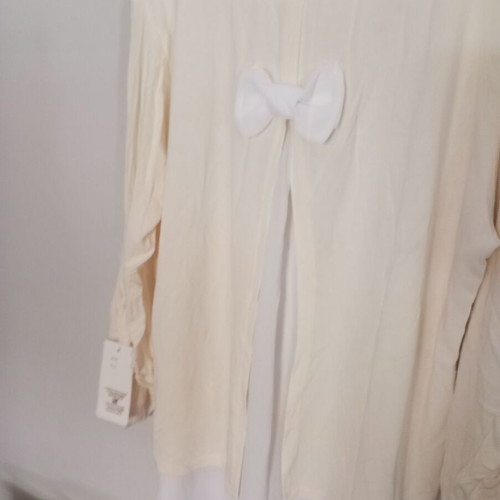 Women's blouse with rhinestone details and bow