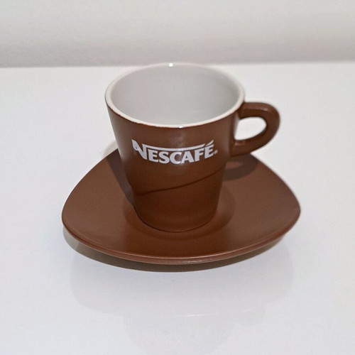 Nescafe collectible ceramic cup and saucer set like new