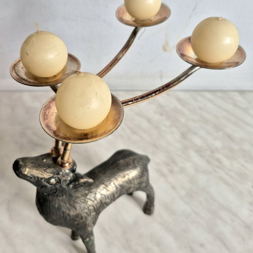 Vintage metal deer-shaped candle holder used