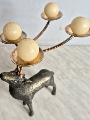 Vintage metal deer-shaped candle holder used