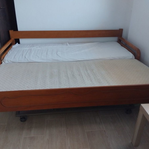 Wooden sofa bed like new with 2 mattresses and metal mechanism