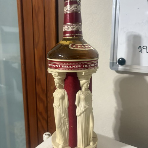 Brandy Ouzouni 7 Stars vintage bottle used, collectible from 1970s