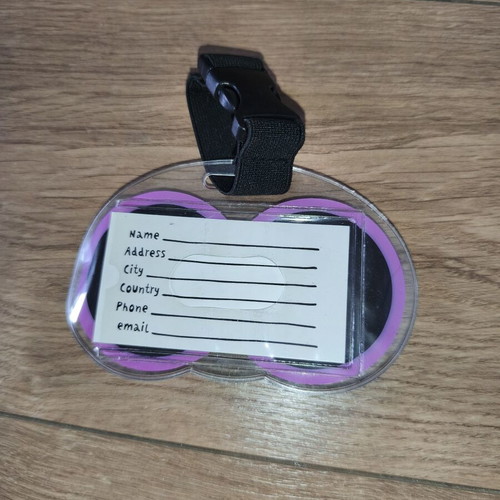 Luggage tag with moving eyes, new