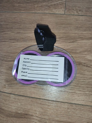 Luggage tag with moving eyes, new