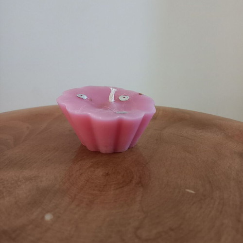 Pink candle like new, flower shape, light rose scent