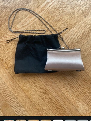Satin clutch bag with chain strap