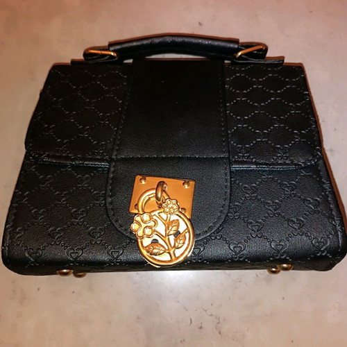 Handbag like new black with metal decoration