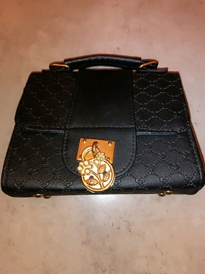 Handbag like new black with metal decoration