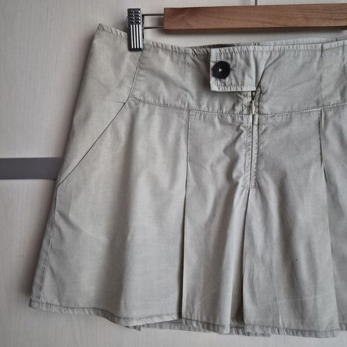 Mini skirt beige with pleats used, size M