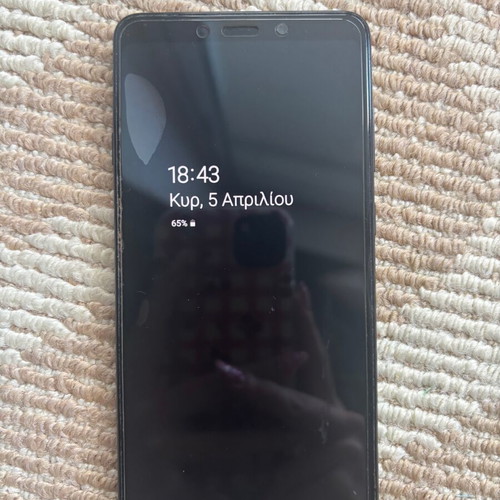 Samsung Galaxy A9 used with case and 4 screen protectors