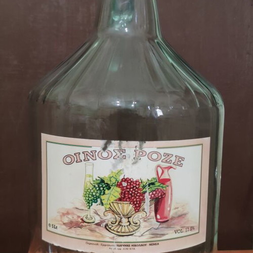 Vintage glass demijohn 5L with handle and original label used