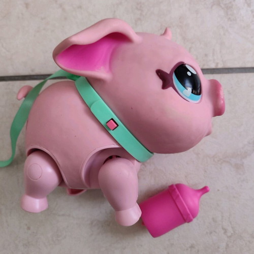 Little Live Pets pig toy used with sounds, interactive