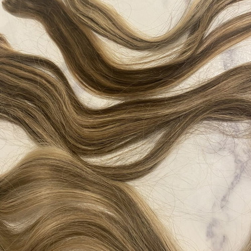 Extensions with clips made of real hair, like new, set of 4