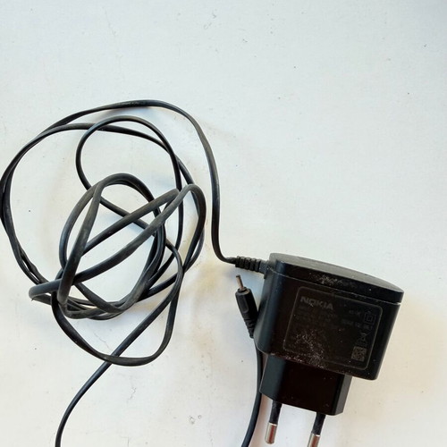 Nokia 6110 and 6103 vintage mobile phones used with chargers