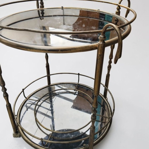 Vintage brass bar trolley with swan finials, used